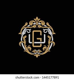 Initial letter U and G, UG, GU, decorative ornament emblem badge, overlapping monogram logo, elegant luxury silver gold color on black background
