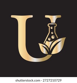 Diseño inicial del logotipo del laboratorio de la letra U combinado con el símbolo del tubo de ensayo y de la hoja