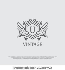 Initial Letter U Luxury Logo template in vector art for Restaurant, Royalty, Boutique, Cafe, Hotel, Heraldic, Jewelry, Fashion and other vector illustration.