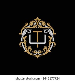 Initial letter U and T, UT, TU, decorative ornament emblem badge, overlapping monogram logo, elegant luxury silver gold color on black background