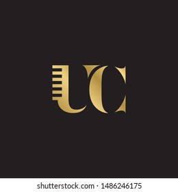 Initial letter uc with comb uppercase modern logo design template elements. Gold letter Isolated on black  background. Suitable for business, consulting group company.