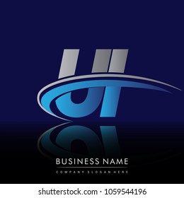 initial letter UI logotype company name colored blue and grey swoosh design. vector logo for business and company identity.