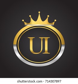 initial letter UI logotype company name with oval shape and crown, gold and silver color. vector logo for business and company identity.