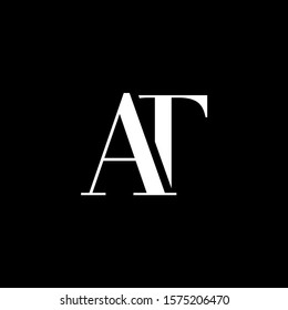 Initial letter AT uppercase modern logo design template elements. White letter Isolated on black background. Suitable for business, consulting group company.