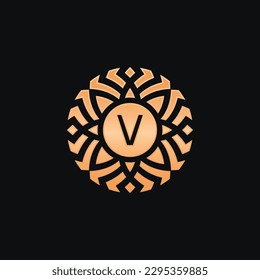 Initial letter V abstract floral medallion emblem logo