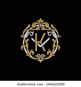 Initial letter V and K, VK, KV, decorative ornament emblem badge, overlapping monogram logo, elegant luxury silver gold color on black background