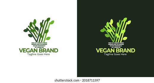 Initial letter V logo design with natural leaf.monocrom vector business and branding logo isolated on green background 