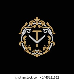 Initial letter V and T, VT, TV, decorative ornament emblem badge, overlapping monogram logo, elegant luxury silver gold color on black background