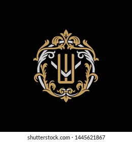 Initial letter V and W, VW, WV, decorative ornament emblem badge, overlapping monogram logo, elegant luxury silver gold color on black background