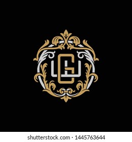 Initial letter W and G, WG, GW, decorative ornament emblem badge, overlapping monogram logo, elegant luxury silver gold color on black background