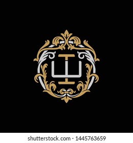 Initial letter W and I, WI, IW, decorative ornament emblem badge, overlapping monogram logo, elegant luxury silver gold color on black background