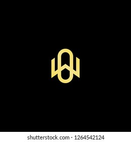 Initial letter WO OW minimalist art logo, gold color on black background.
