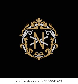 Initial letter X and N, XN, NX, decorative ornament emblem badge, overlapping monogram logo, elegant luxury silver gold color on black background