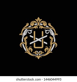 Initial letter X and U, XU, UX, decorative ornament emblem badge, overlapping monogram logo, elegant luxury silver gold color on black background