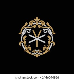 Initial letter X and Y, XY, YX, decorative ornament emblem badge, overlapping monogram logo, elegant luxury silver gold color on black background