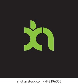 initial letter xh linked round lowercase logo green