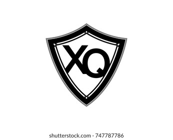 Initial letter XQ shield logo black monogram vector illustration