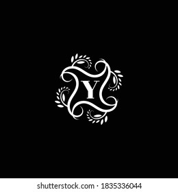 Initial Letter Y Flourish circle monogram logo.