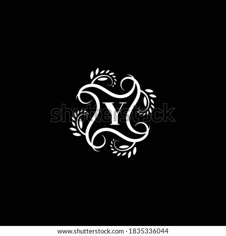 Initial Letter Y Flourish circle monogram logo.