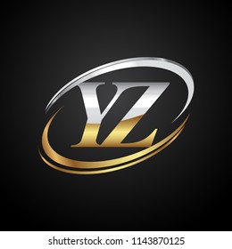 initial letter YZ logotype company name colored gold and silver swoosh design. isolated on black background.