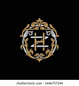 Initial letter Z and H, ZH, HZ, decorative ornament emblem badge, overlapping monogram logo, elegant luxury silver gold color on black background