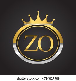 initial letter ZO logotype company name with oval shape and crown, gold and silver color. vector logo for business and company identity