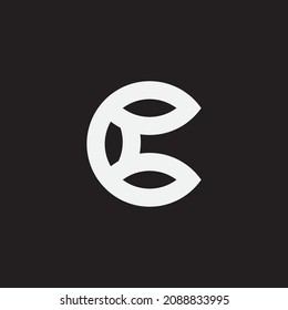 Initial letterC semicircle with cut into pattern.