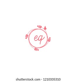initial letters eq beauty spa logo design, with flower, love and butterfly illustration