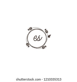 initial letters es beauty spa logo design, with flower, love and butterfly illustration