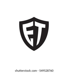 Initial letters ET shield shape black monogram logo