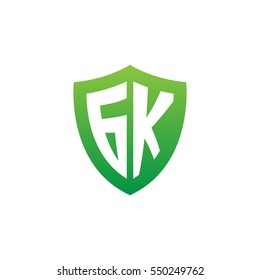 Initial letters GK shield shape green simple logo
