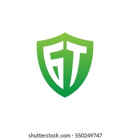 Initial letters GT shield shape green simple logo