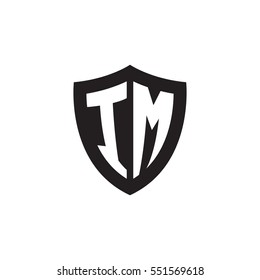 Initial letters IM shield shape black monogram logo