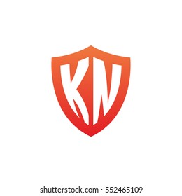 Initial letters KN shield shape red simple logo