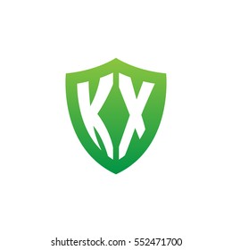 Initial letters KX shield shape green simple logo