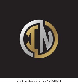 IN initial letters looping linked circle elegant logo golden silver black background