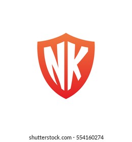 Initial letters NK shield shape red simple logo