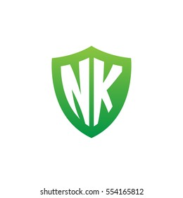 Initial letters NK shield shape green simple logo