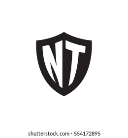 Initial letters NT shield shape black monogram logo