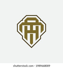 Initial letters T, A, TA or AT overlapping, interlocked monogram logo, gold color on white background