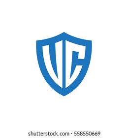 Initial letters UC, VC, shield shape blue simple logo