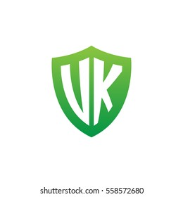 Initial letters UK, VK, shield shape green simple logo
