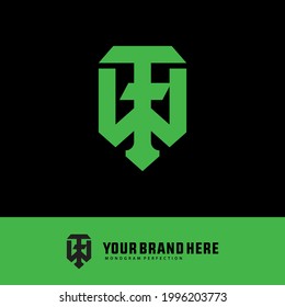 Initial letters W, F, FW or WF overlapping, interlocked monogram logo, green color on black background