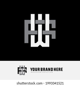 Initial letters W, F, WF or FW overlapping, interlocked monogram logo, white and gray color on black background