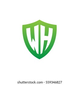 Initial letters WH shield shape green simple logo