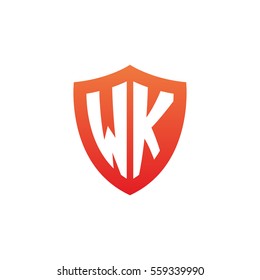 Initial letters WK shield shape red simple logo