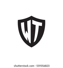 Initial letters WT shield shape black monogram logo