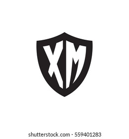 Initial letters XM shield shape black monogram logo
