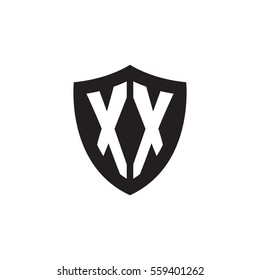 Initial letters XX shield shape black monogram logo