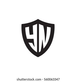 Initial letters YN shield shape black monogram logo